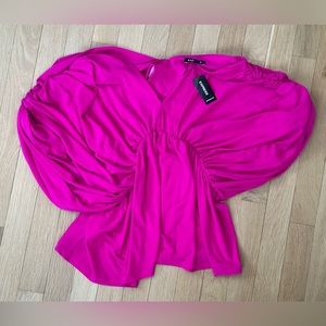 Beautiful brand new Express top. Unused.